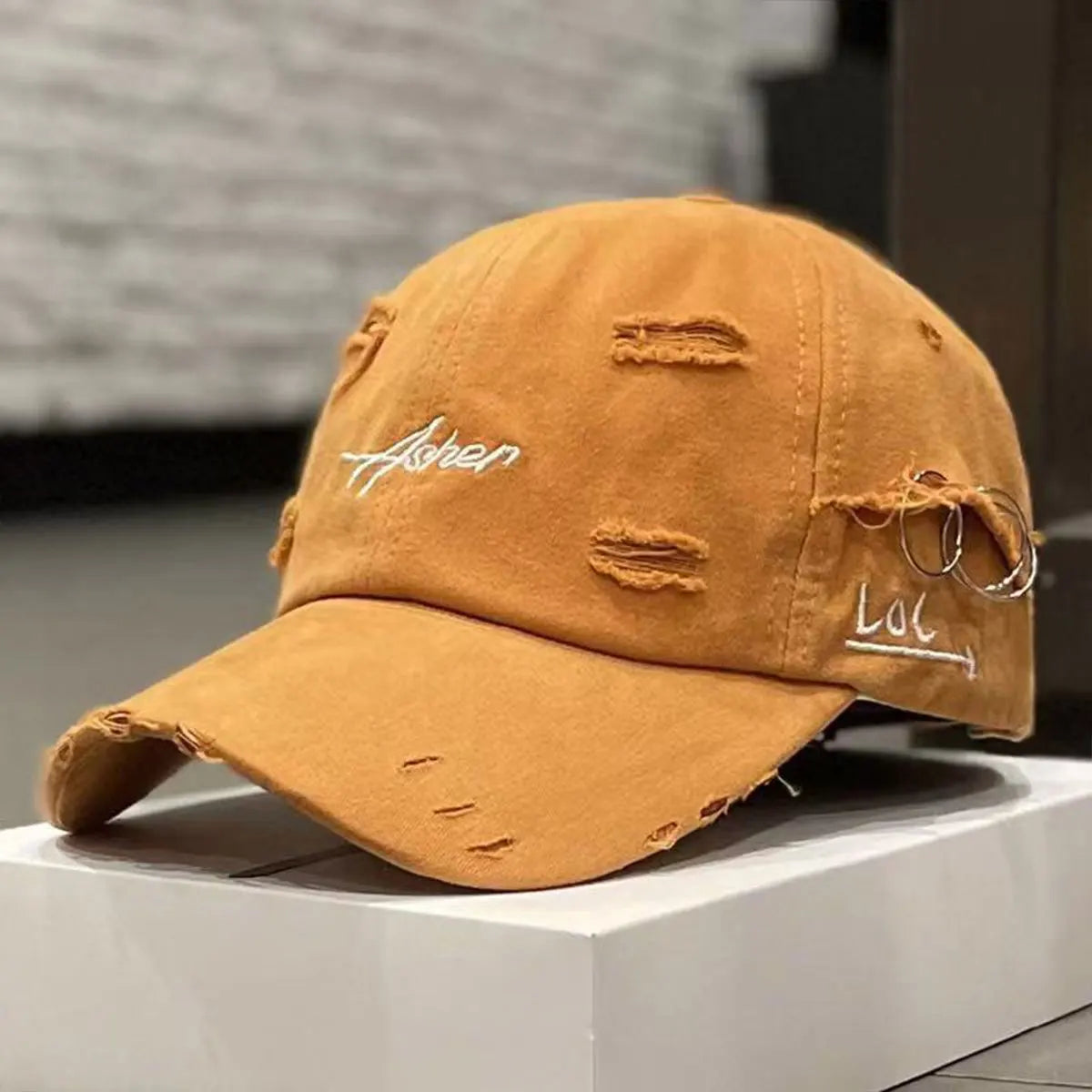 Retro perforated duckbill cap