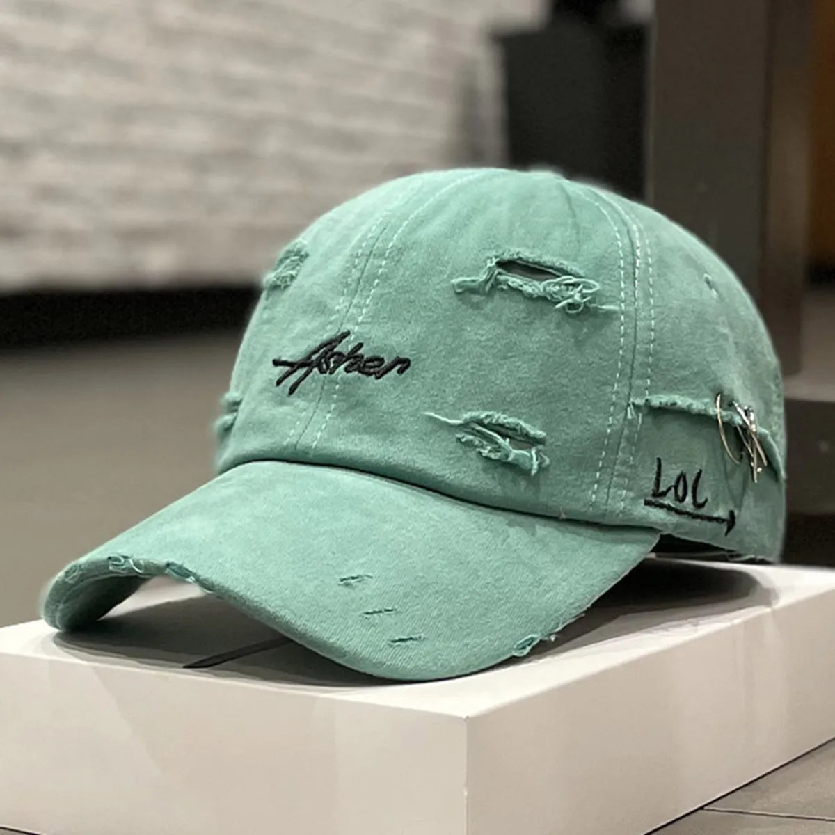 Retro perforated duckbill cap